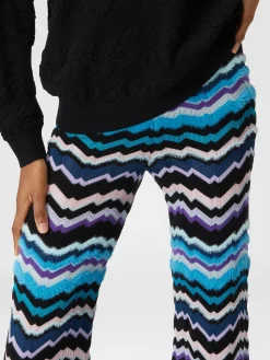 Trousers with Greek zig zag motif in viscose and wool