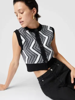 Wool bolero with buttons and terrycloth stitch chevron