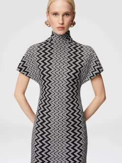 Zig zag mini-dress with sculptural sleeves