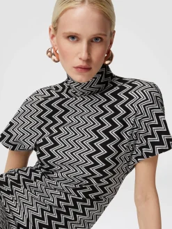 Zig zag mini-dress with sculptural sleeves