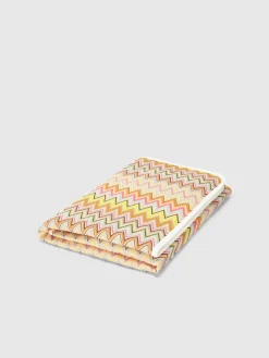 Zig zag stretch cotton blanket with contrasting piping