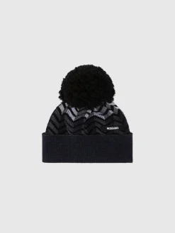 Zig zag virgin wool hat with logo and pom pom
